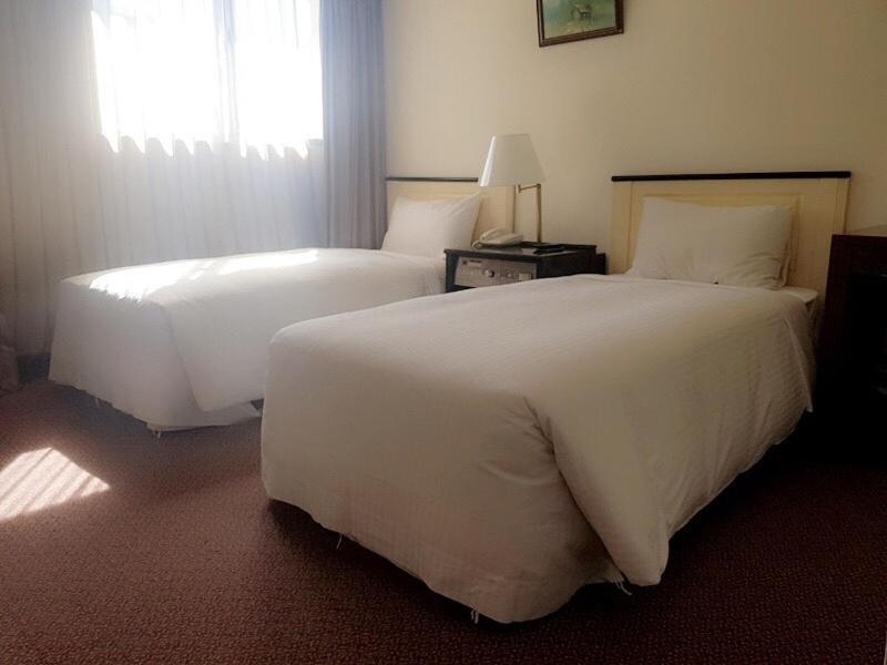 Onetel - Ximen Hotel Джунхъ Екстериор снимка